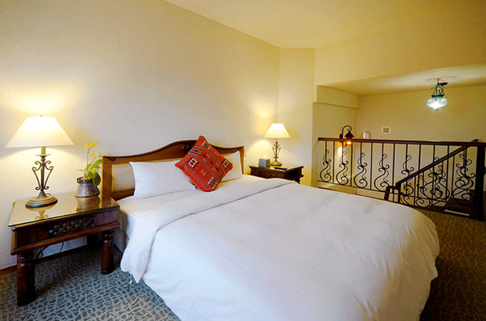 Promisedland Resort & Lagoon Shoufeng Exterior foto A bedroom at the hotel